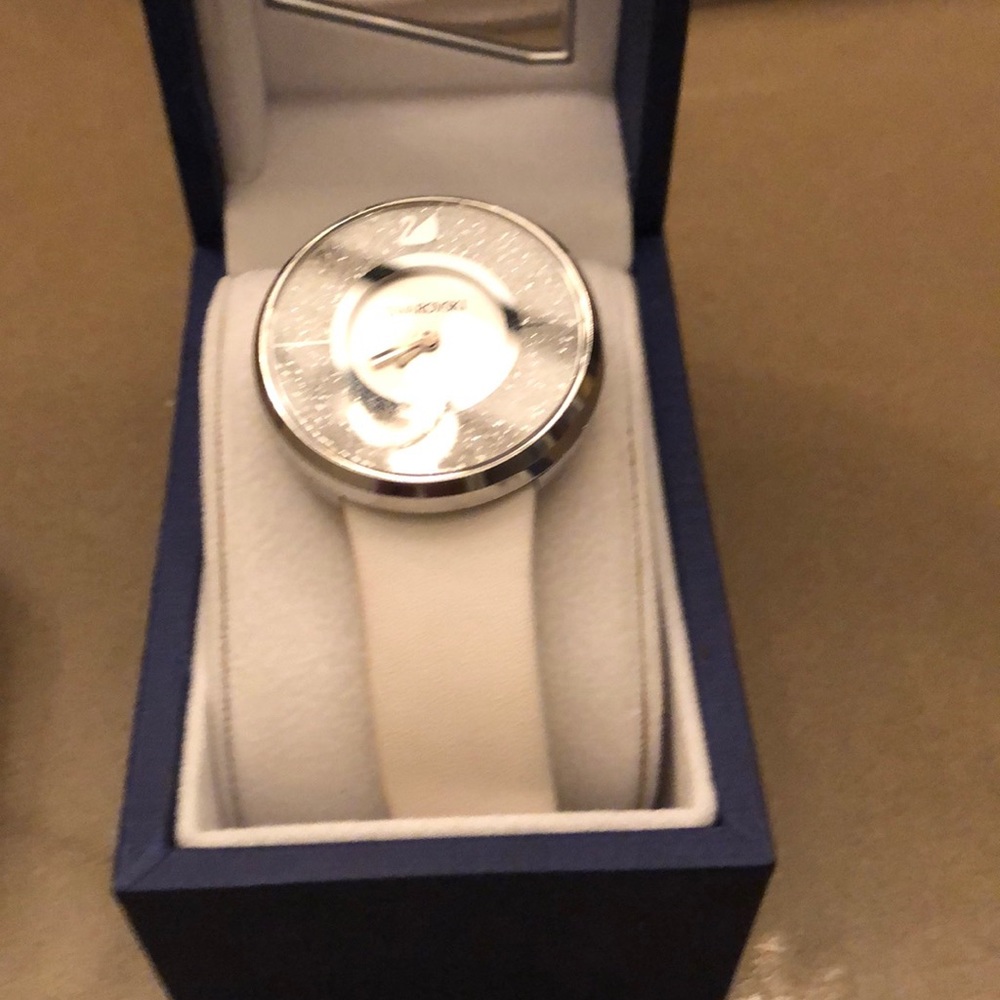 Swarovski crystal round watch; needs a battery